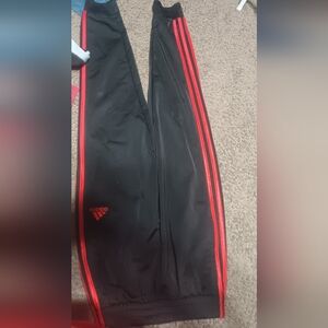 Black and red addidas glow